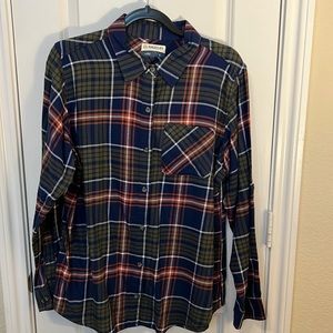 Long sleeve button up shirt. Sleeves can be rolled up or worn down.